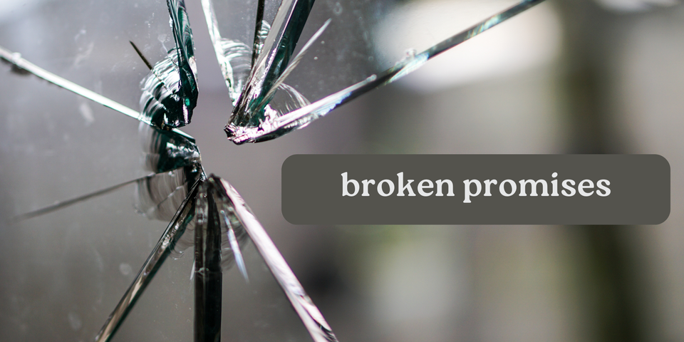 Broken glass with text over the top saying broken promises